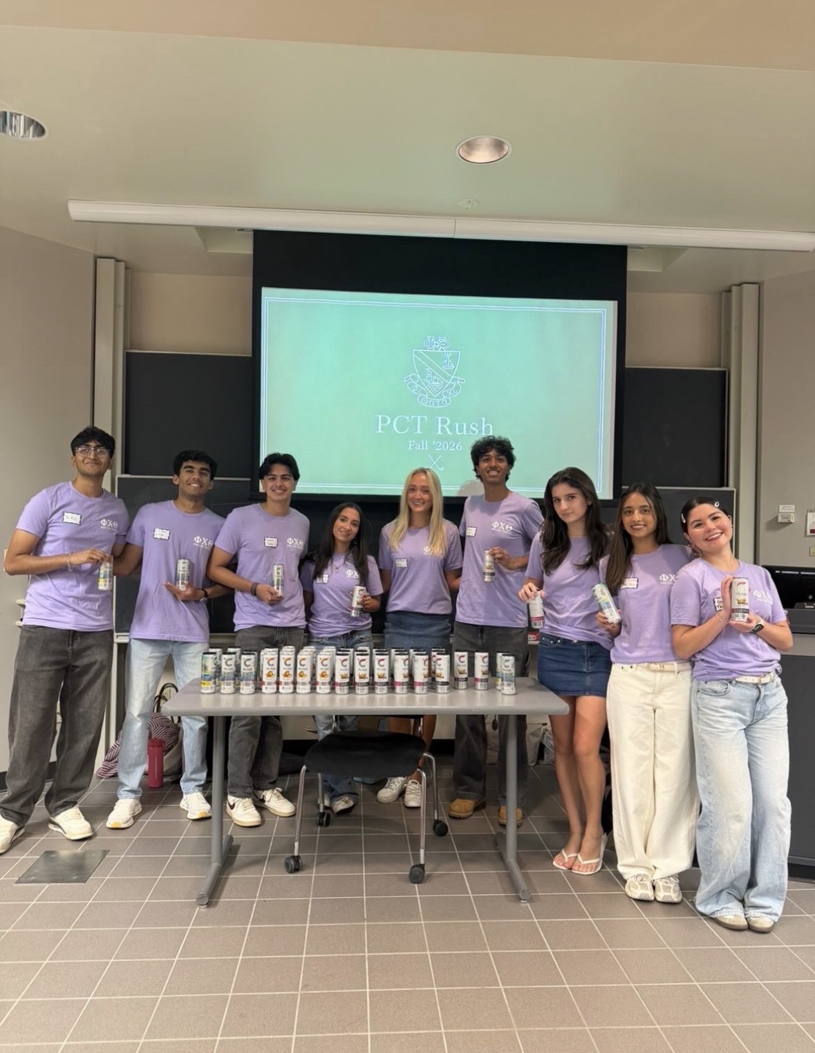 Members in PCT shirts at a recruitment event